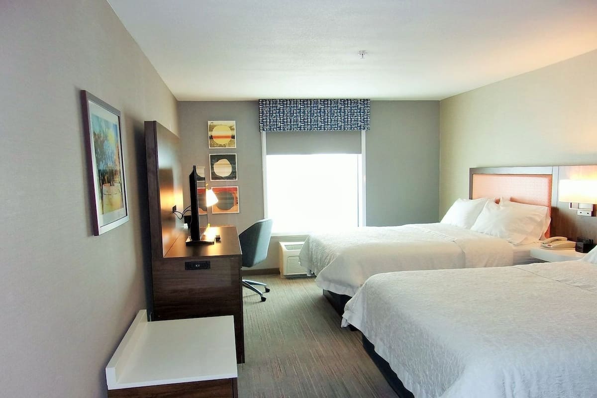 Premium bedding, desk, blackout drapes, iron/ironing board