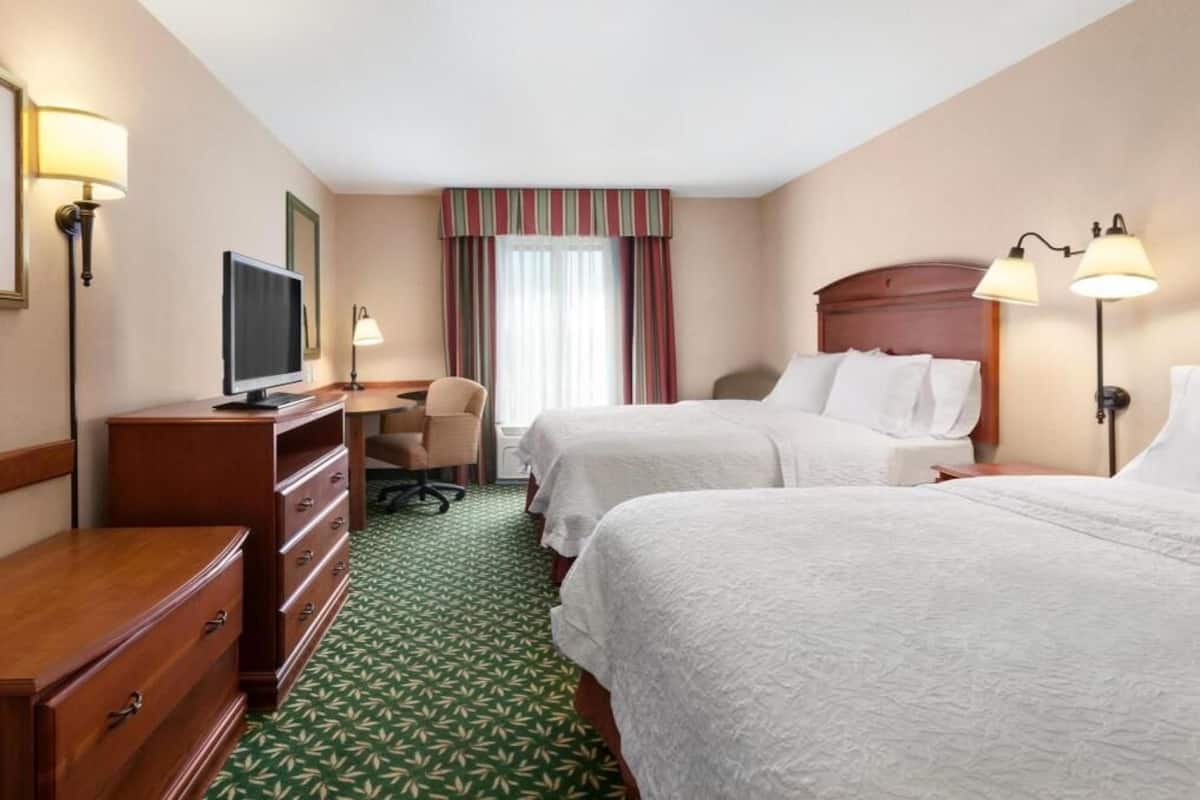 Premium bedding, desk, blackout drapes, iron/ironing board