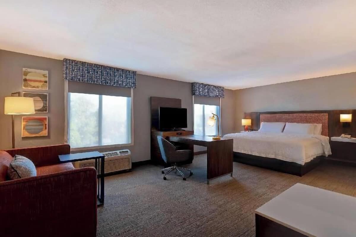 Premium bedding, desk, blackout drapes, iron/ironing board