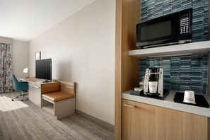 Luxe beddengoed, een kluis op de kamer, een bureau
