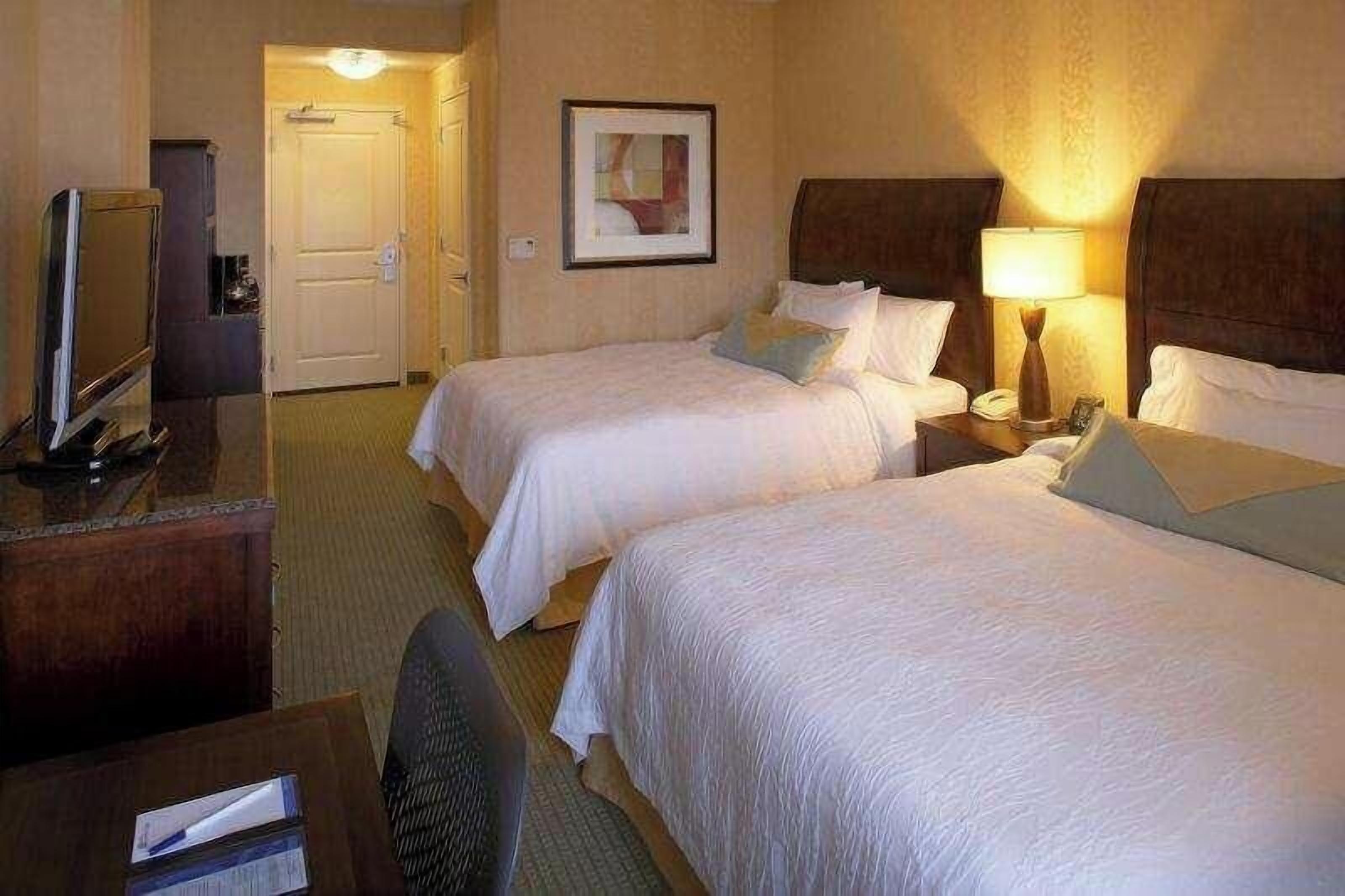 Hypo-allergenic bedding, Tempur-Pedic beds, desk, laptop workspace
