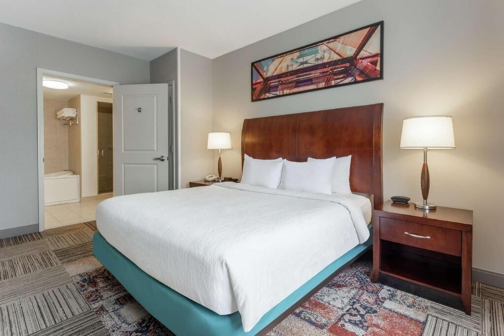 Hypo-allergenic bedding, Tempur-Pedic beds, desk, laptop workspace