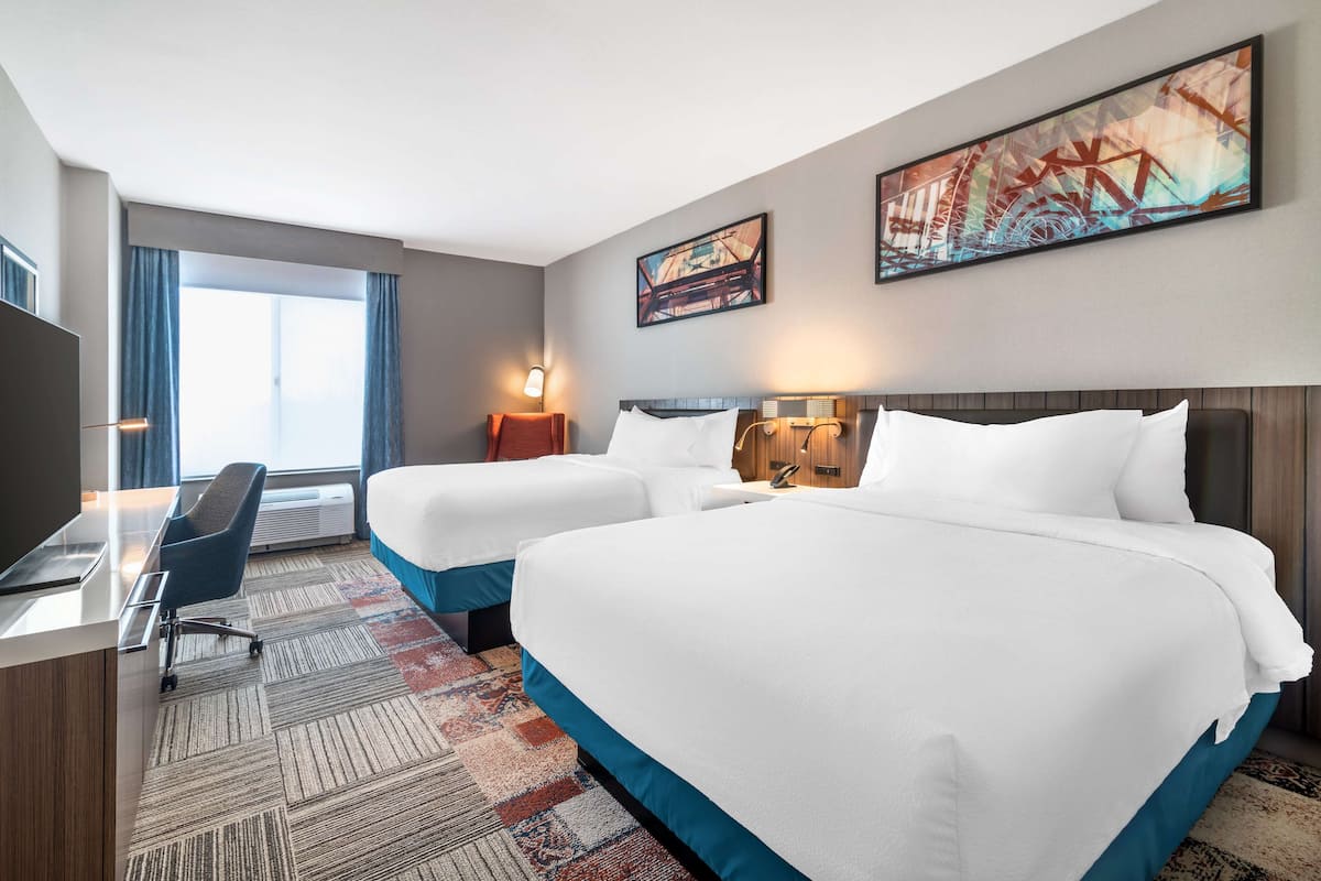 Hypo-allergenic bedding, Tempur-Pedic beds, desk, laptop workspace