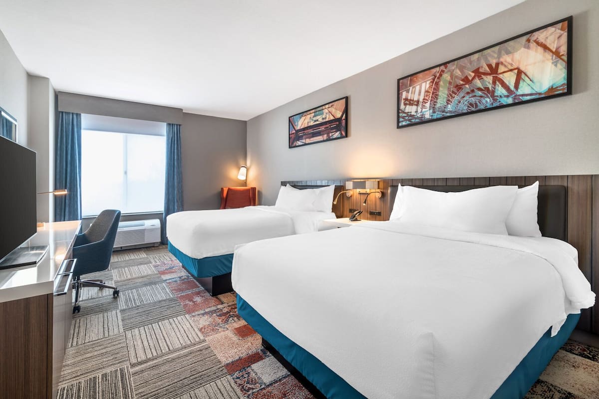 Hypo-allergenic bedding available, Tempur-Pedic beds, desk