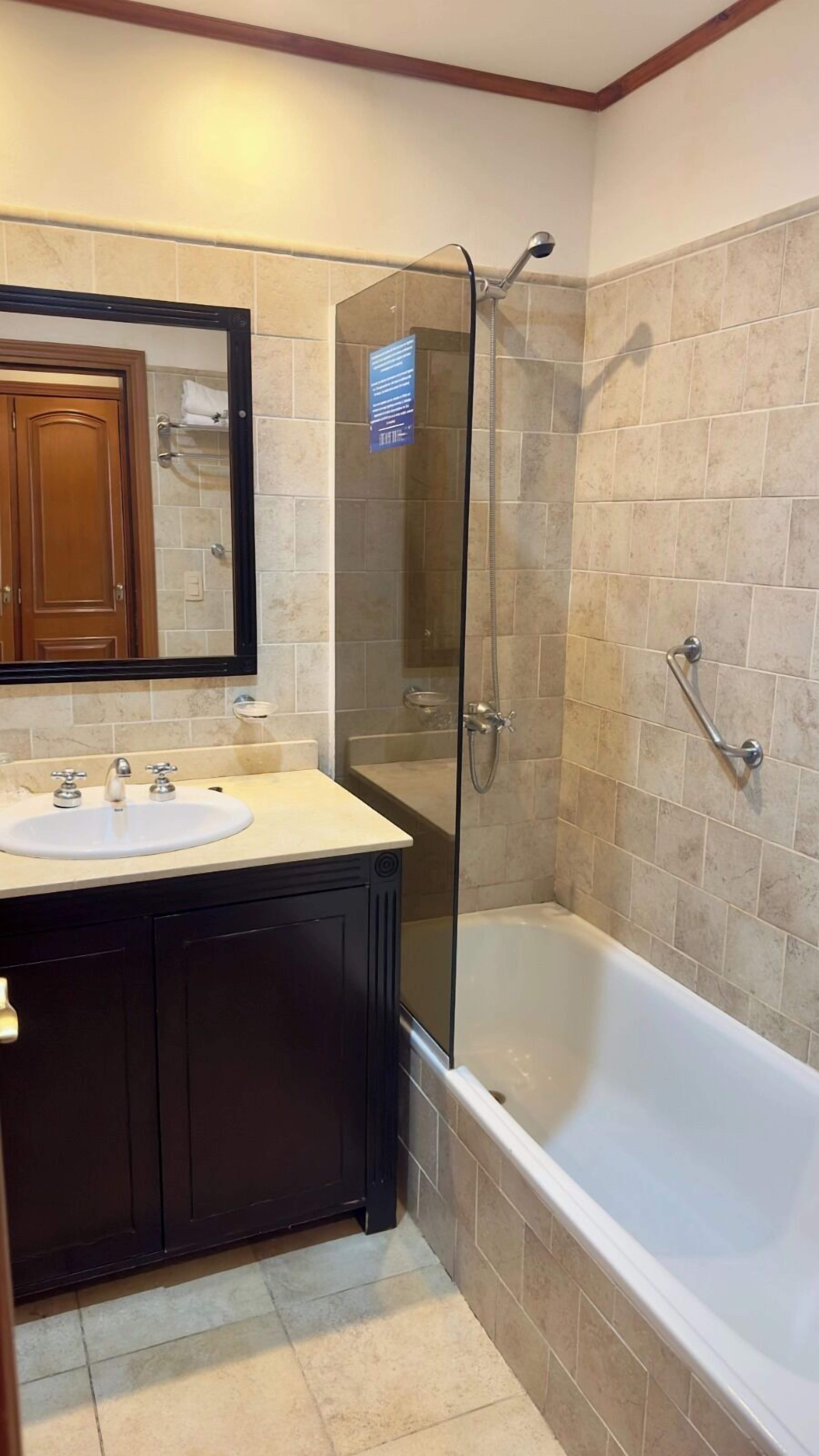 double room, lake view | bathroom | bathtub, deep-soaking bathtub, rainfall showerhead, free toiletries