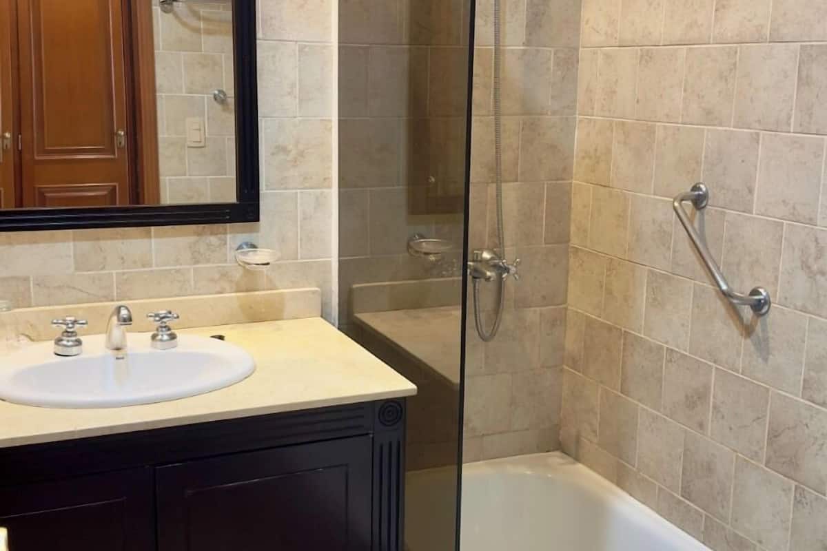 double room, lake view | bathroom | bathtub, deep-soaking bathtub, rainfall showerhead, free toiletries