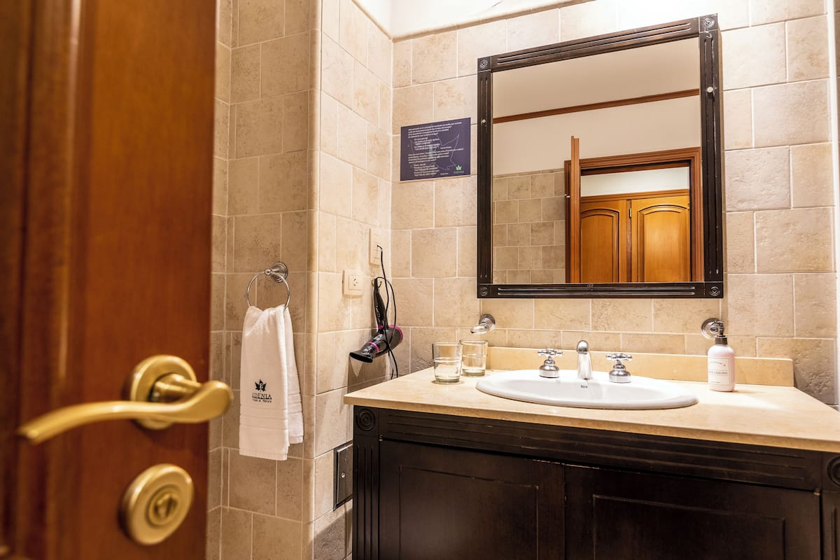 double room, lake view | bathroom | bathtub, deep-soaking bathtub, rainfall showerhead, free toiletries