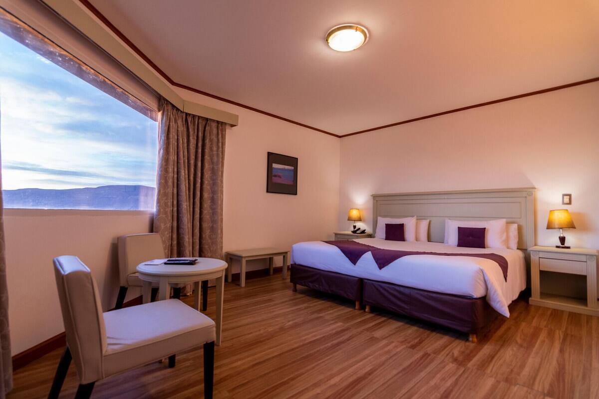 Premium bedding, down comforters, pillowtop beds, minibar