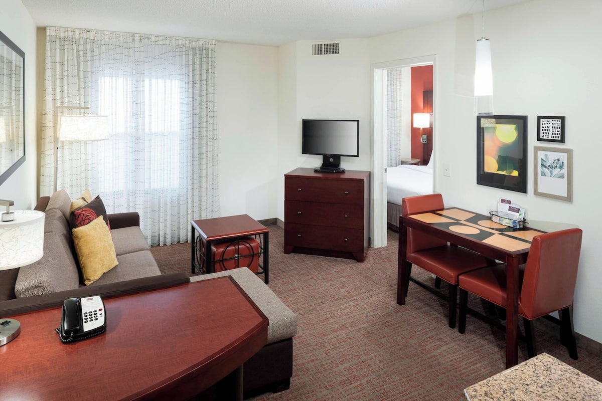 Suite, 1 Bedroom, Non Smoking | Living area | Plasma TV, fireplace