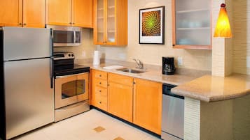 Fridge, microwave, stovetop, coffee/tea maker