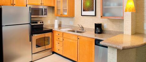 Fridge, microwave, stovetop, coffee/tea maker