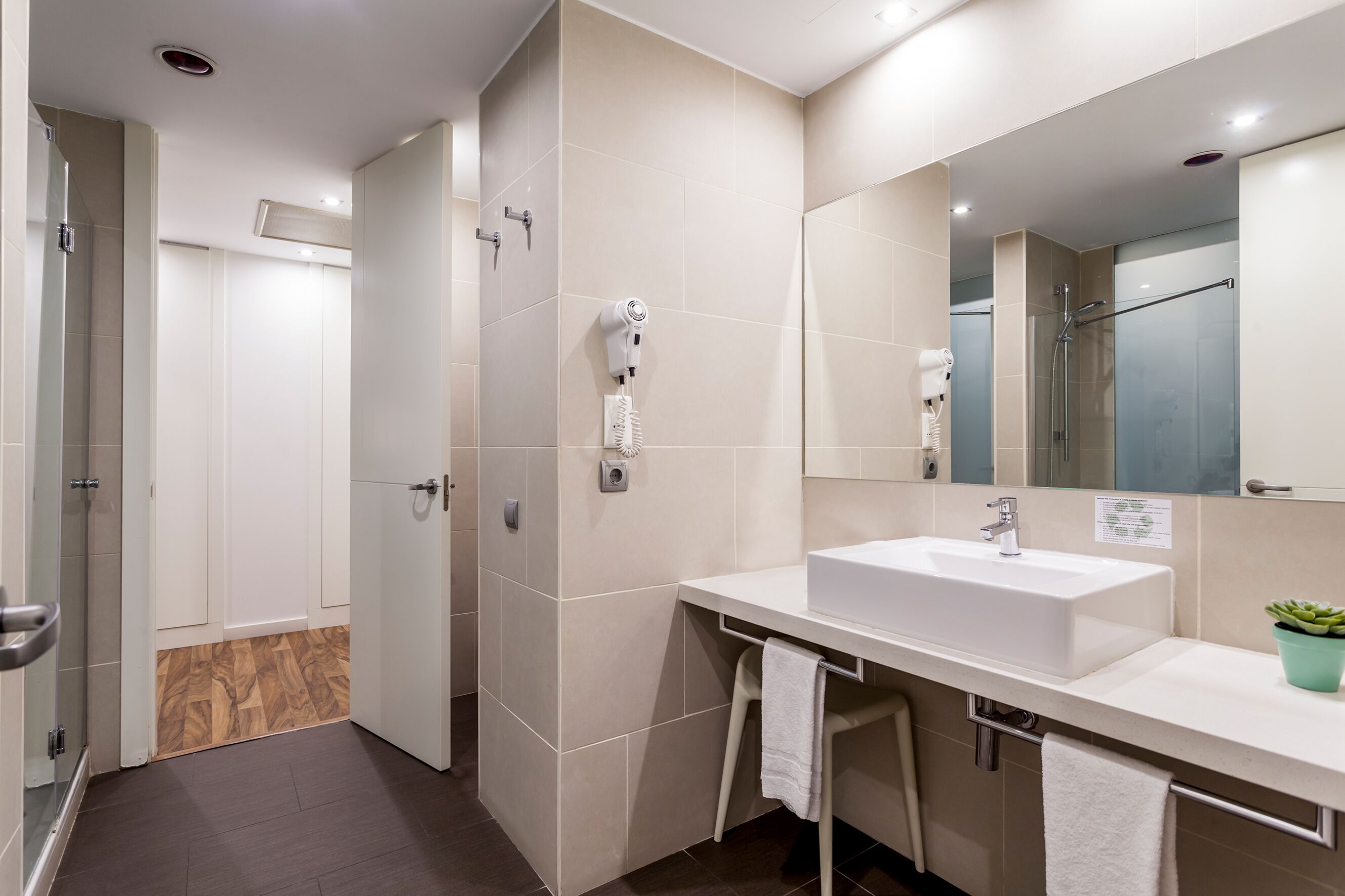 junior suite | bathroom | hair dryer, towels