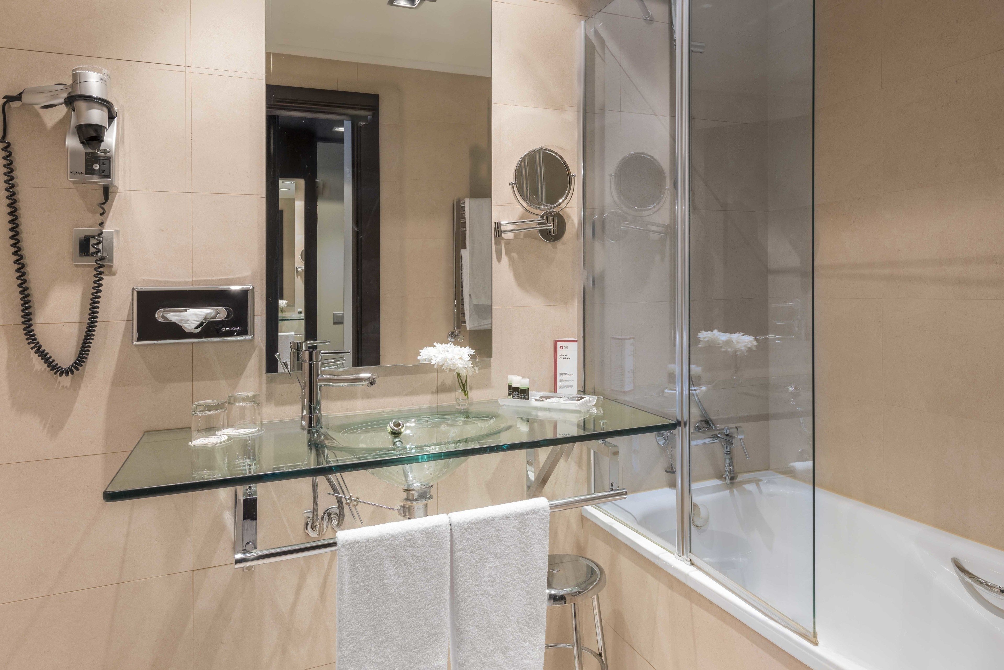 shower, eco-friendly toiletries, hair dryer, towels