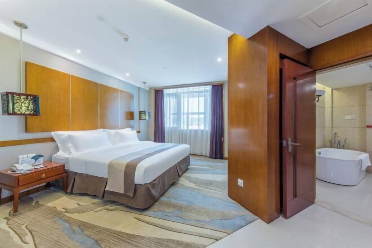 Premium bedding, down comforters, pillowtop beds, in-room safe