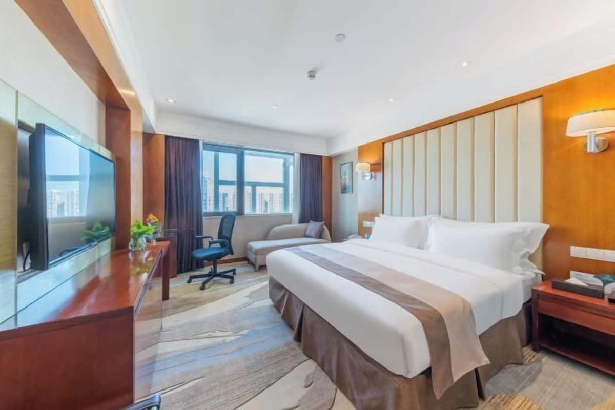 Premium bedding, down comforters, pillowtop beds, in-room safe