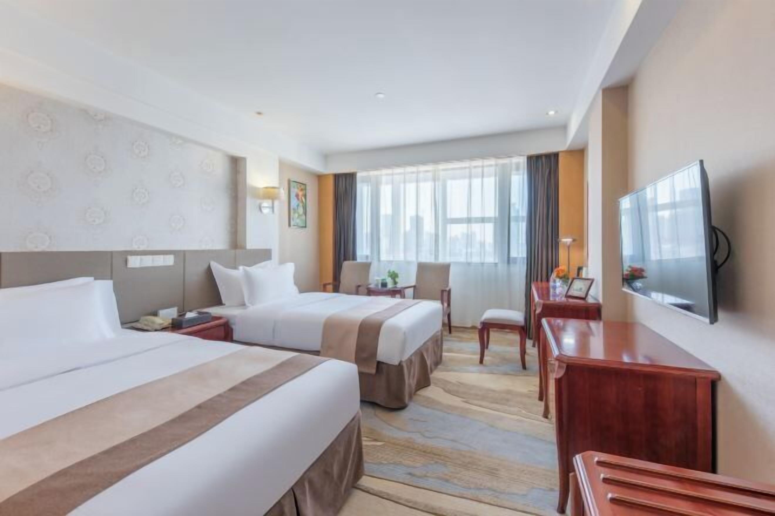 Premium bedding, down comforters, pillowtop beds, in-room safe