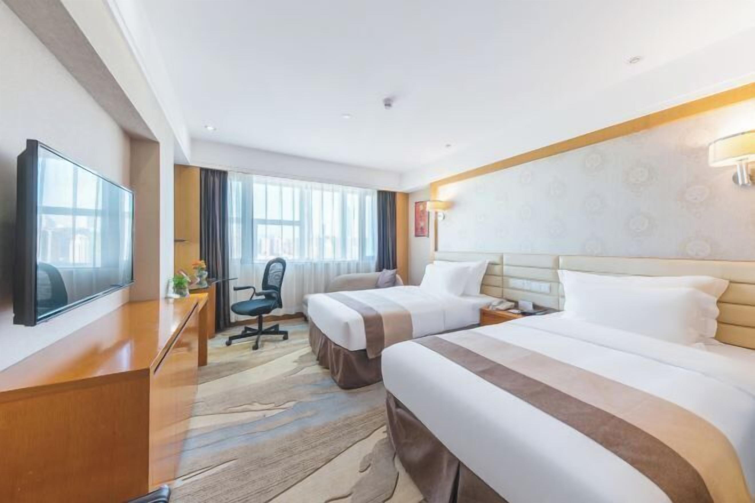 Premium bedding, down comforters, pillowtop beds, in-room safe