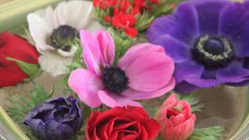 A bouquet of flowers in a clear glass vase.
