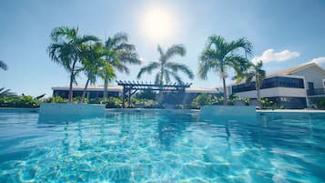 Outdoor pool, pool umbrellas, pool loungers