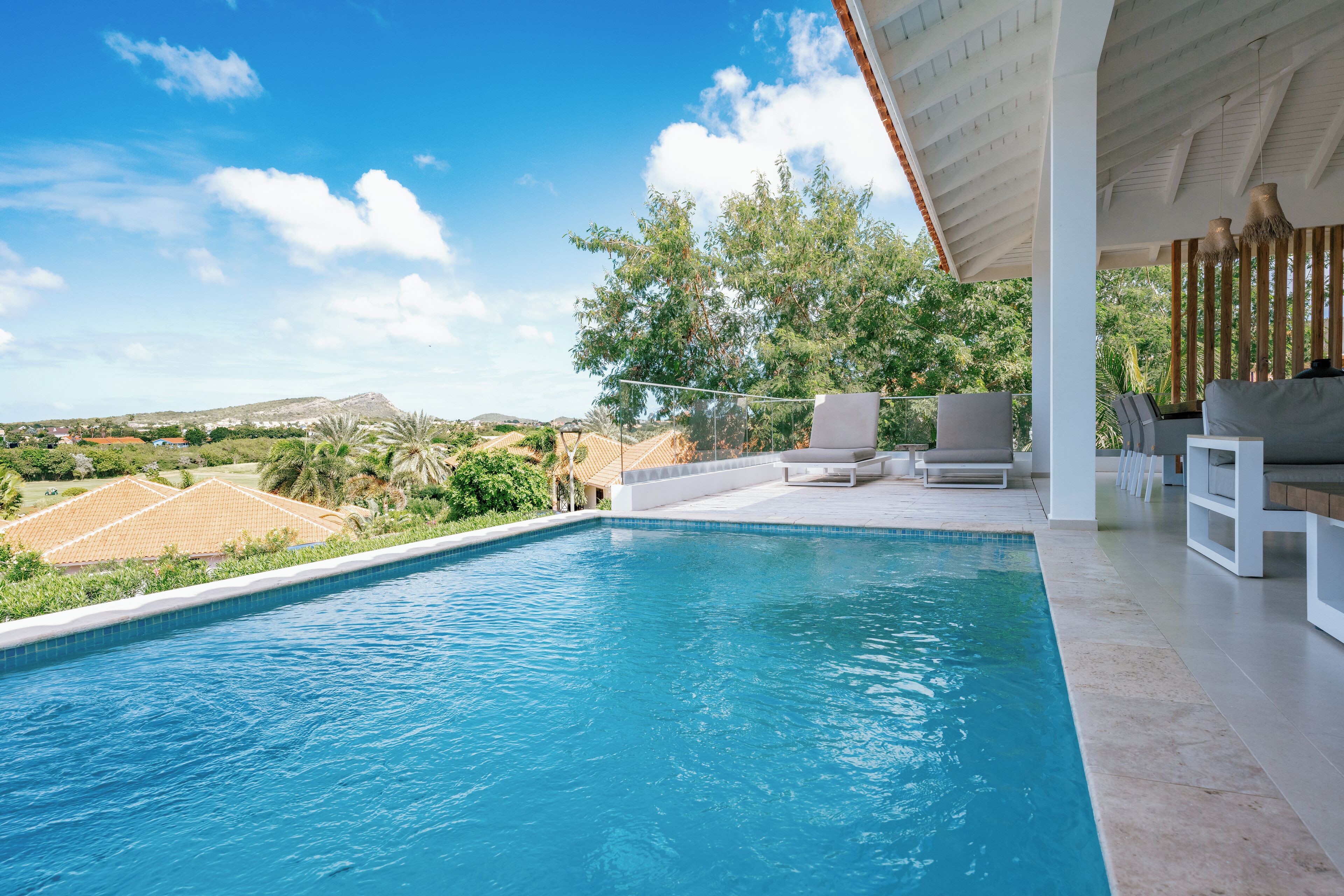 outdoor pool, pool umbrellas, pool loungers