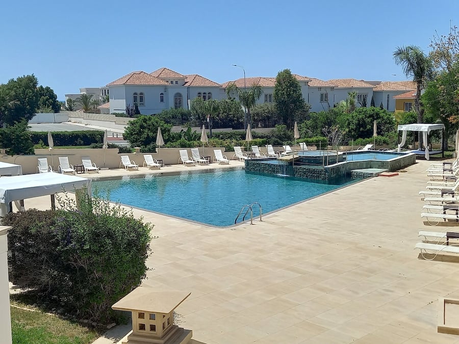 Outdoor pool, open 9:00 AM to 6:00 PM, pool umbrellas, pool loungers