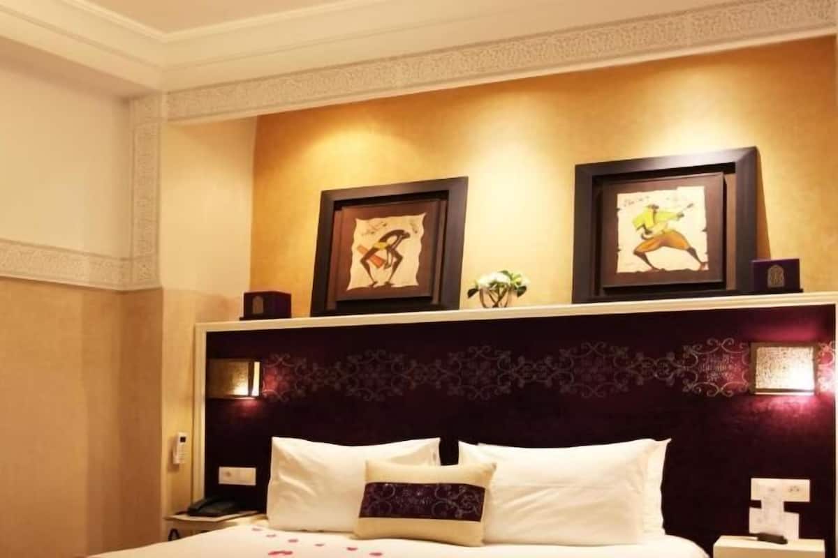 Ropa de cama de alta calidad y minibar