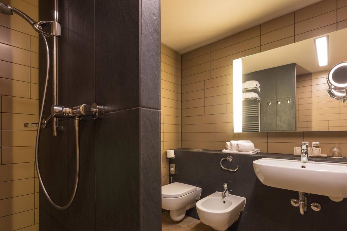 standard double or twin room ( forest view ) | bathroom | deep-soaking bathtub, bathrobes, slippers, towels