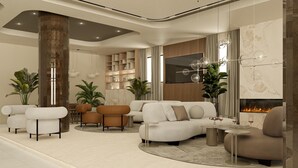 Una sala de estar moderna con chimenea, sofás, sillones y una estantería.