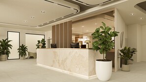 Una moderna zona de recepción con mostrador de mármol, plantas en macetas grandes y un área de descanso con sillas.