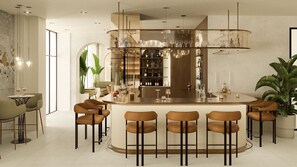 Zona de bar moderna con una isla central, taburetes y una estantería para vinos.