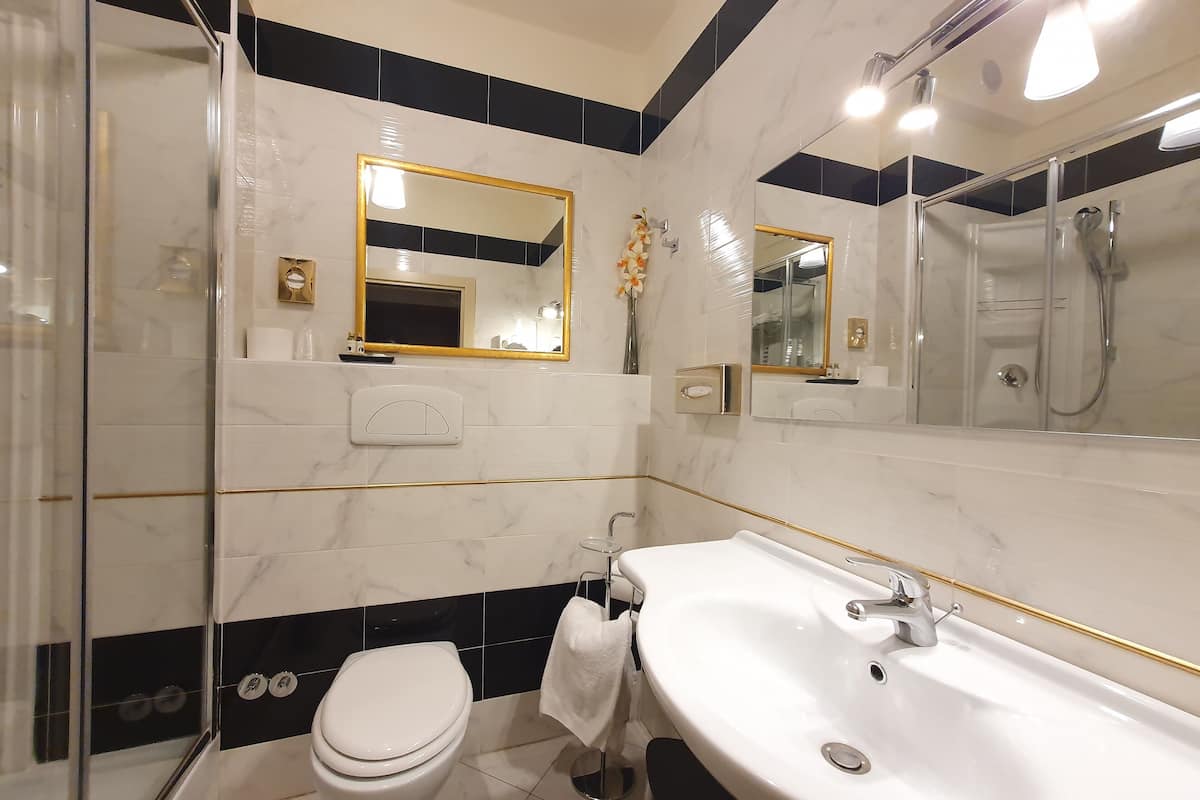 superior twin room | bathroom | shower, designer toiletries, hair dryer, bidet