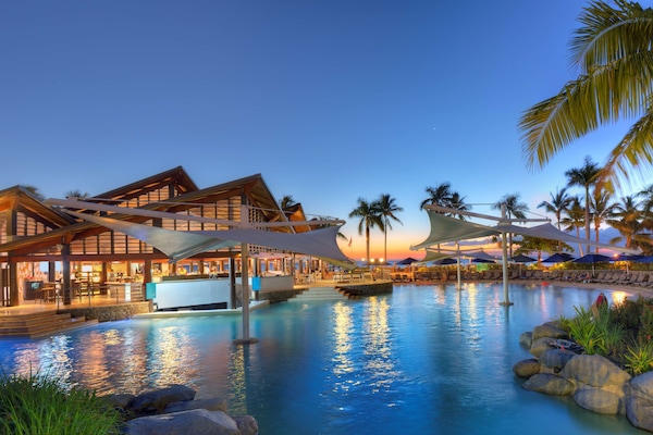 4 outdoor pools, open 8:00 AM to 7:00 PM, pool umbrellas, sun loungers