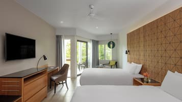 Luxe beddengoed, een minibar, een kluis op de kamer, een bureau