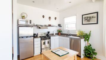 One Bedroom Suite | Private kitchen | Fridge, microwave, stovetop, dishwasher