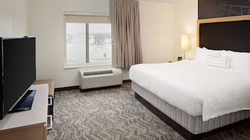 Premium bedding, pillow-top beds, desk, laptop workspace