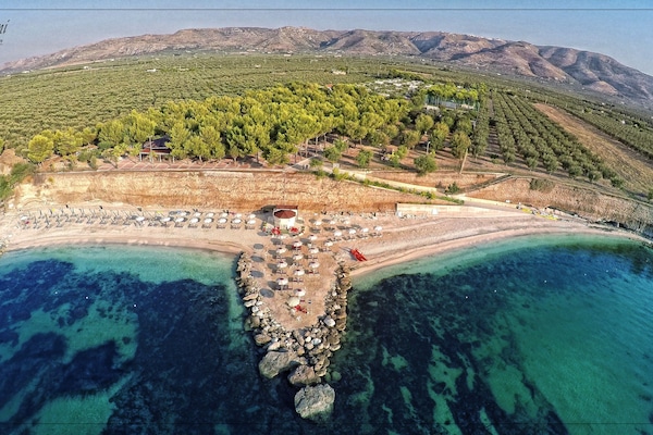 Private beach nearby, black sand, sun loungers, beach umbrellas