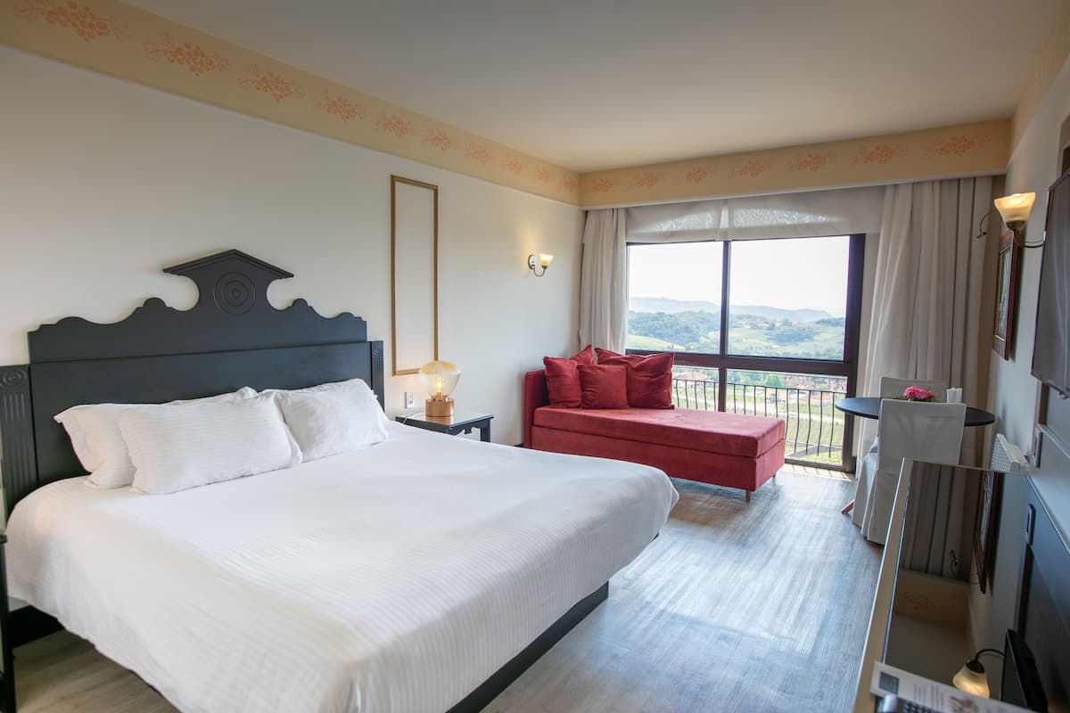 Regencial Vista Panoramica Casal | 1 slaapkamer, hypoallergeen beddengoed, pillowtop-bedden, een minibar