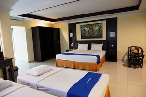Quadruple Room with Balcony | Minibar, in-room safe, desk, WiFi (free)