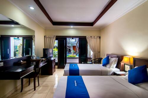 Deluxe Room, Terrace, Poolside | Minibar, in-room safe, desk, free WiFi