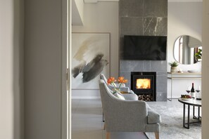 Superior Suite, 2 Bedrooms | Living area | LED TV