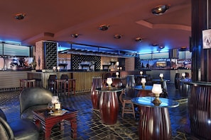 6 bars/lounges, poolside bar, beach bar