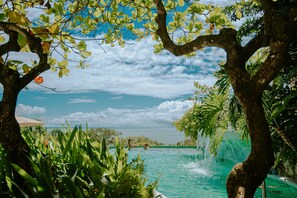 3 outdoor pools, open 7:00 AM to 7:00 PM, pool umbrellas, sun loungers