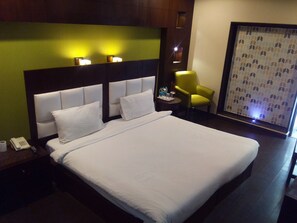 Deluxe Room | Ruang tamu | TV 