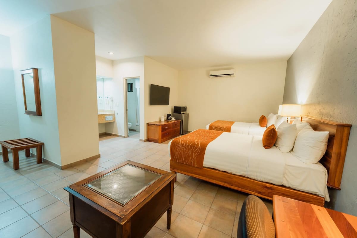 Suite, 2 Double Beds, Non Smoking | In-room safe, desk, iron/ironing board, rollaway beds