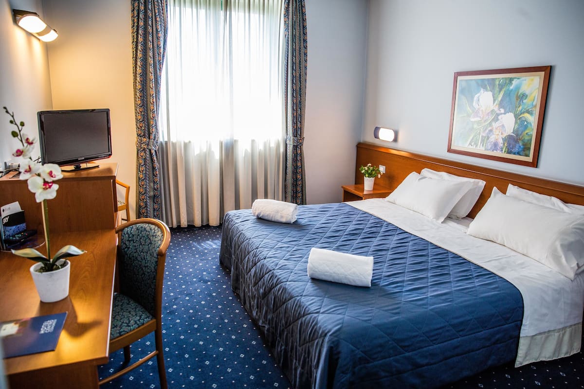 Down comforters, minibar, desk, blackout drapes