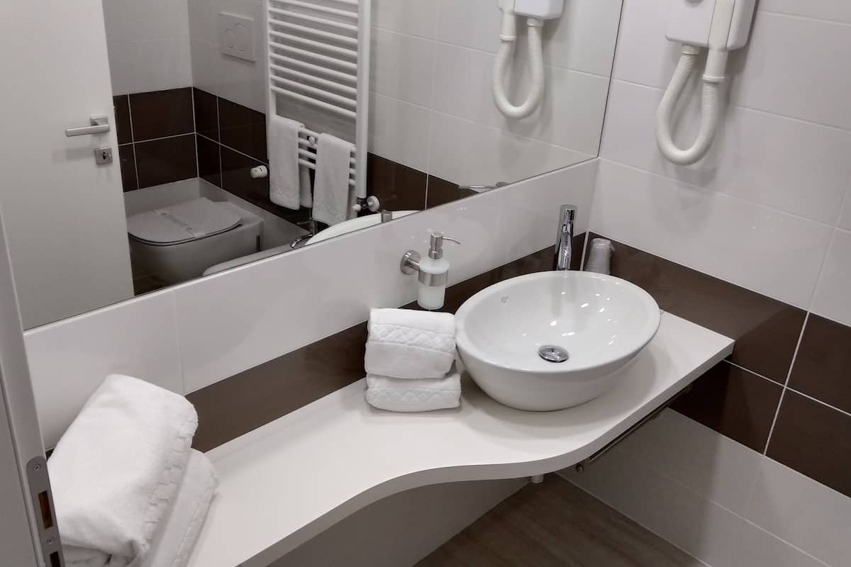 free toiletries, hair dryer, bidet, towels