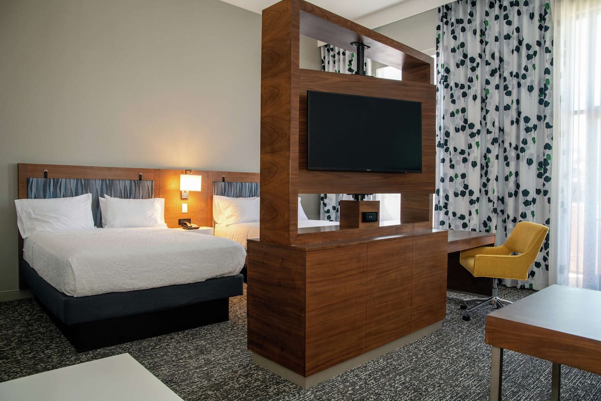Two queen studio suite | Blackout drapes, iron/ironing board, free WiFi, bed sheets