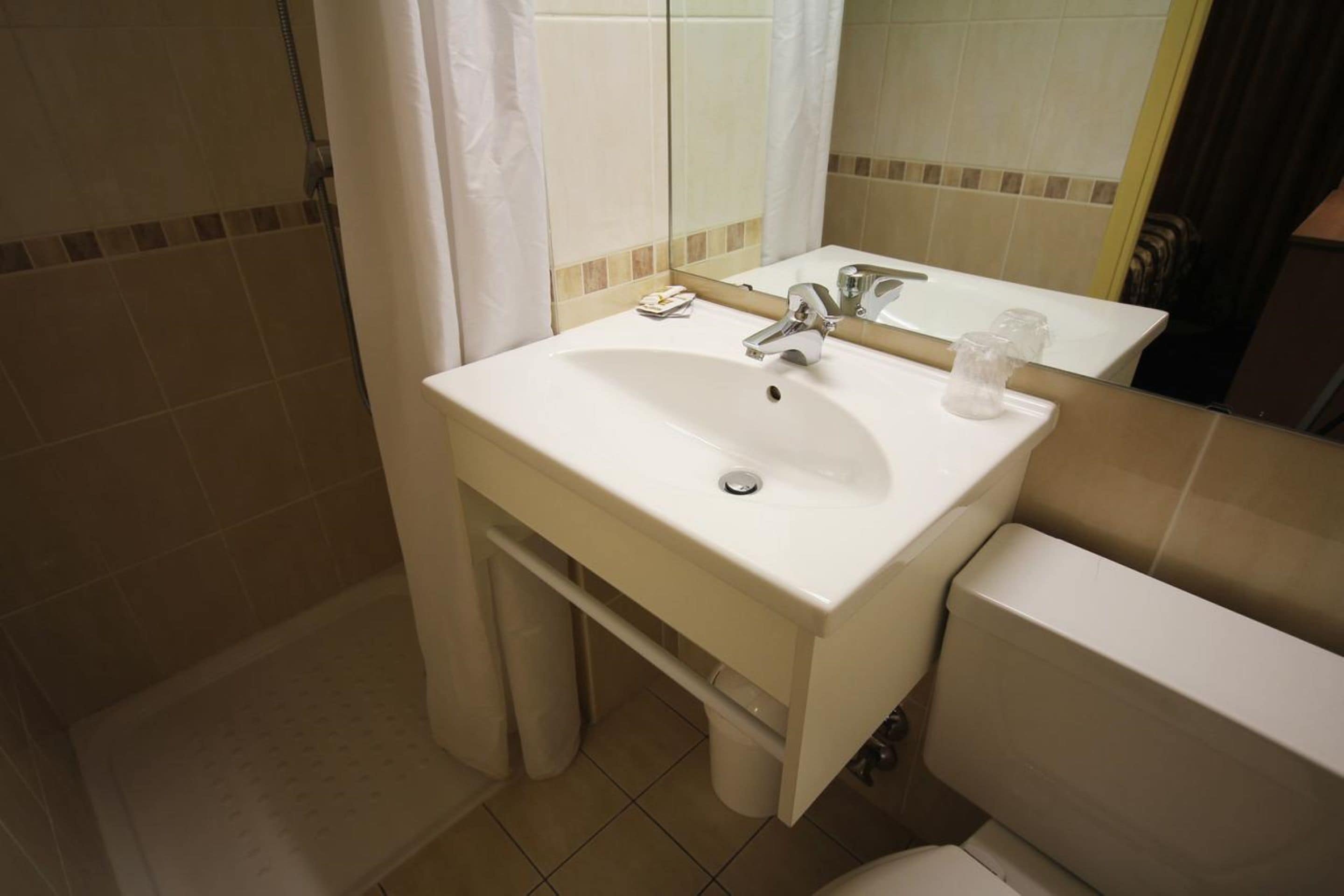 single room | bathroom | shower, hair dryer, towels