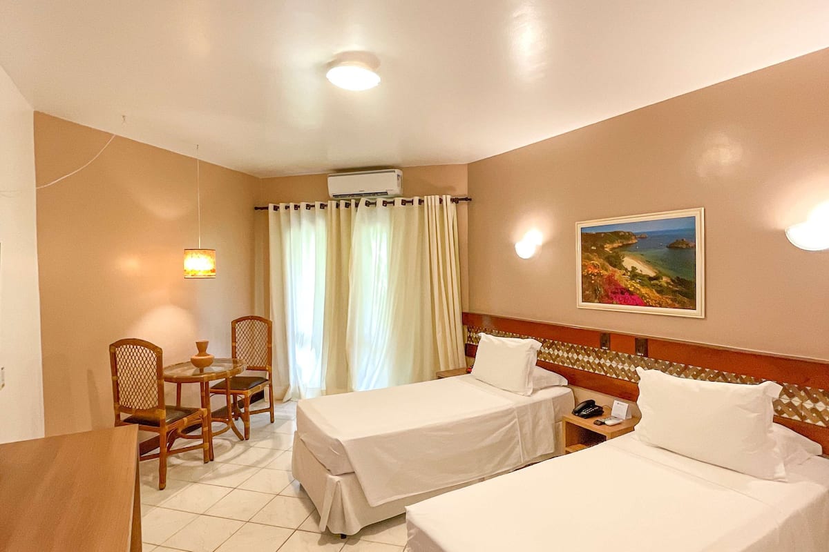 deluxe room, 2 single beds, non smoking (third bed is single bed) | 1 bedroom, minibar, in-room safe, desk