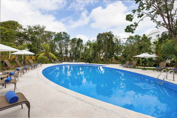 Outdoor pool, open 8:00 AM to 10:00 PM, pool umbrellas